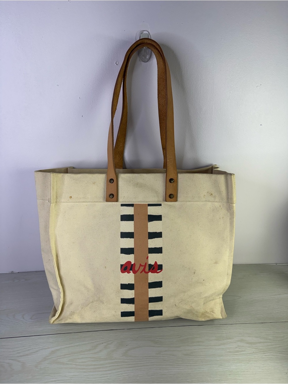 Parker Thatch canvas tote bag with leather strap.
